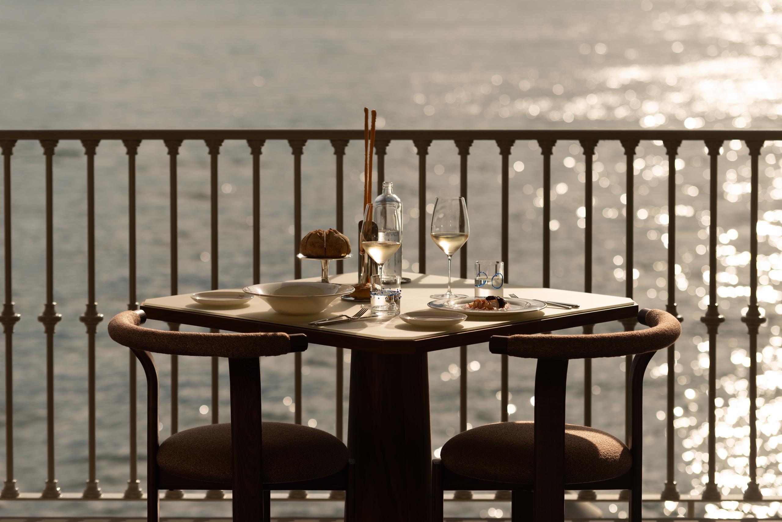 Table for two on the lakeside terrace at sunset, Palazzo Genazzini