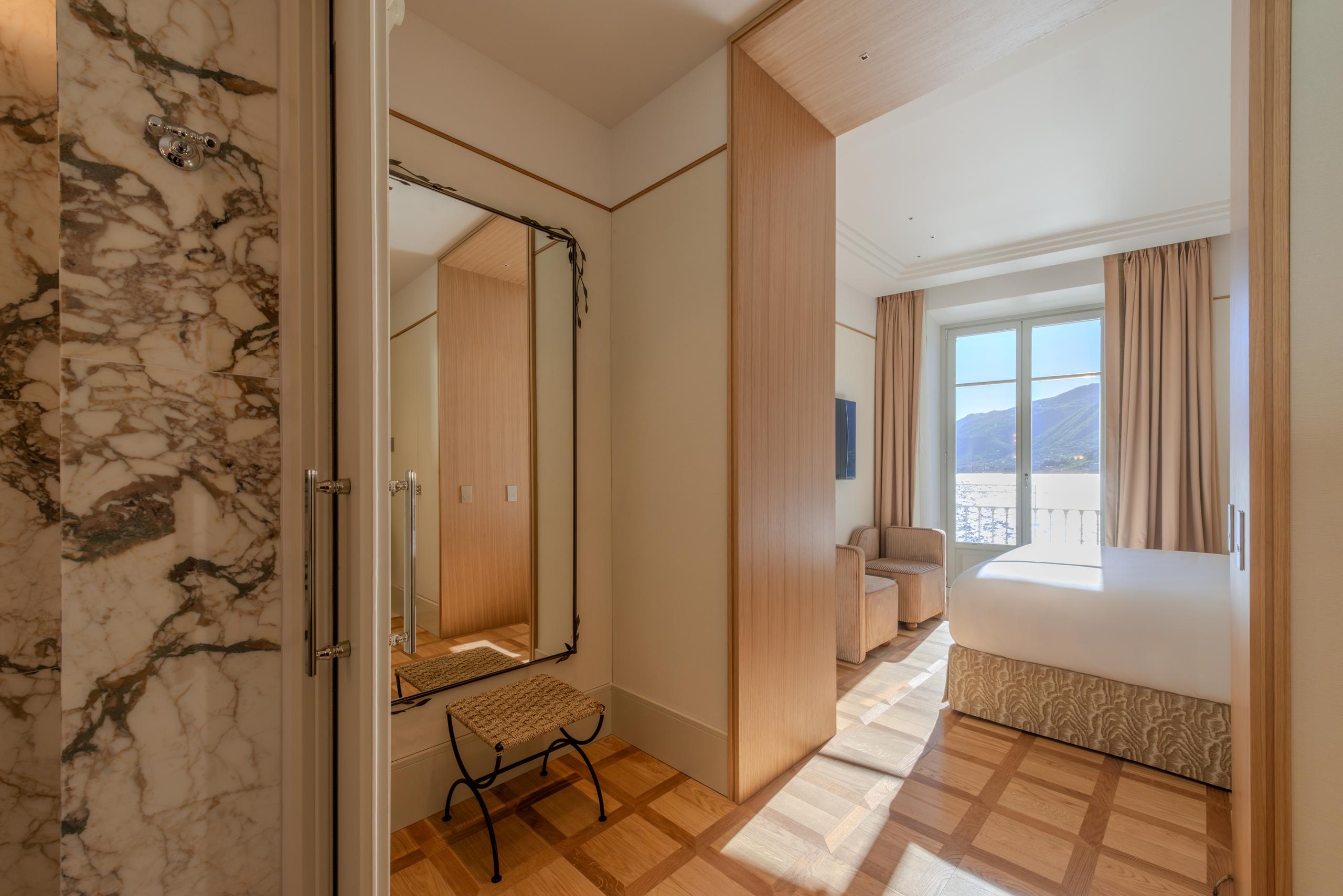 Junior Suite entrance and bedroom - Palazzo Genazzini