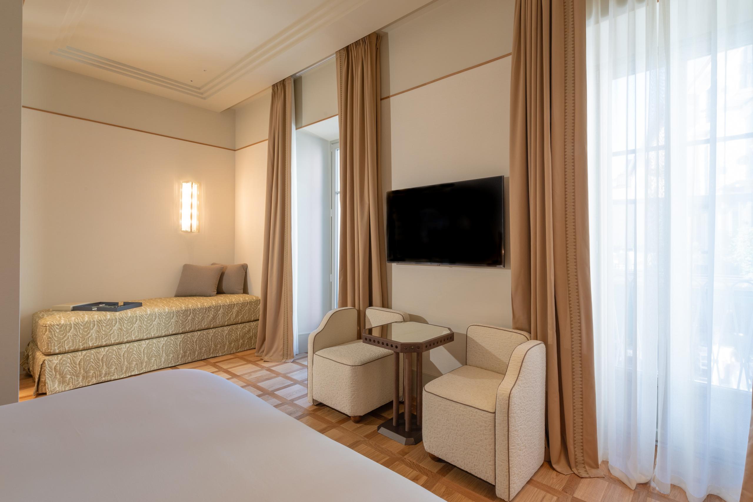 Prestige Room, zona giorno con poltrone - Palazzo Genazzini