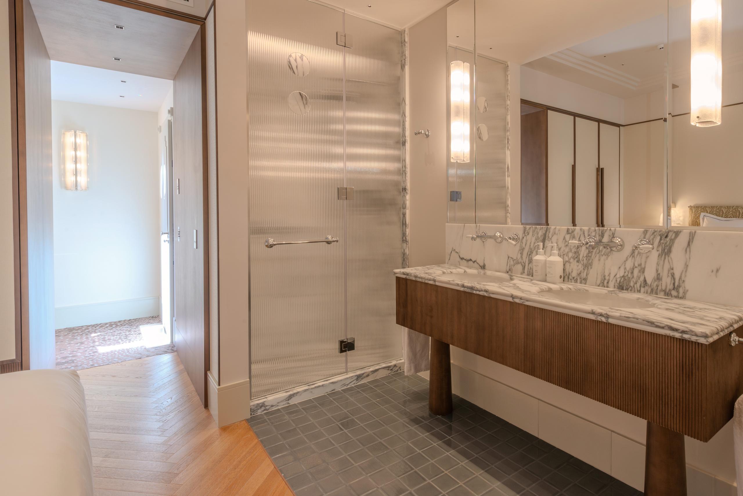Superior Room bathroom with shower and vanity - Palazzo Genazzini