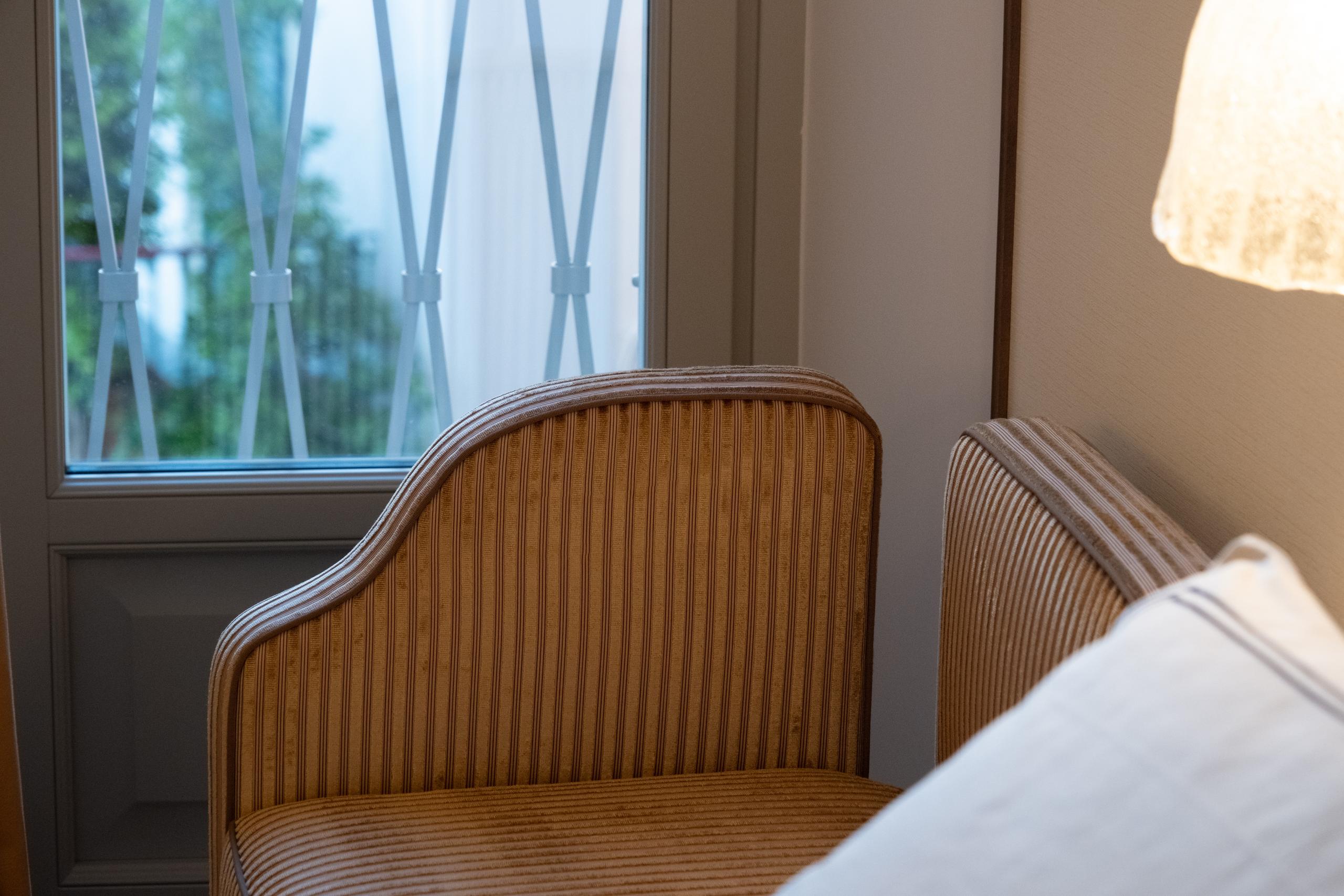 Superior Room cane armchair - Palazzo Genazzini